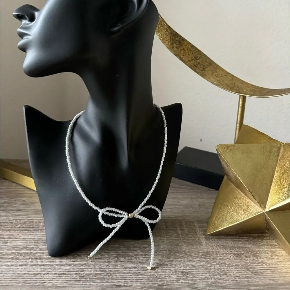 Free People White Pearl Bow Necklace with Gold Accents - Picture 3 of 3